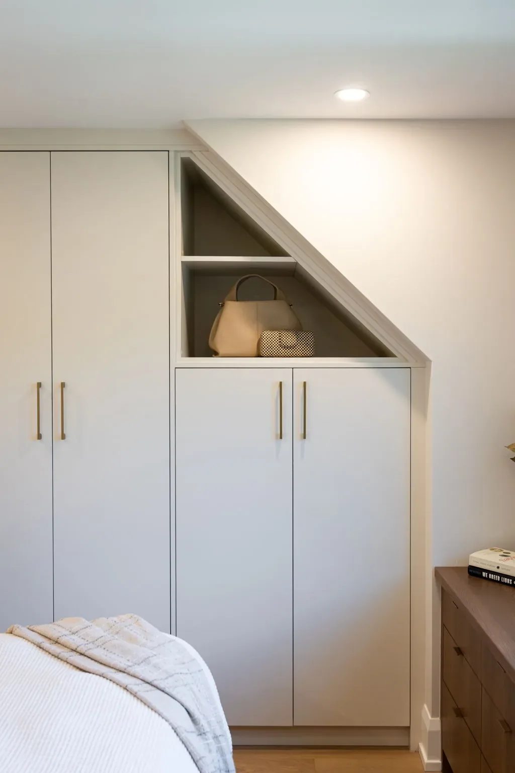 Built-in storage worked into the space beneath the staircase.