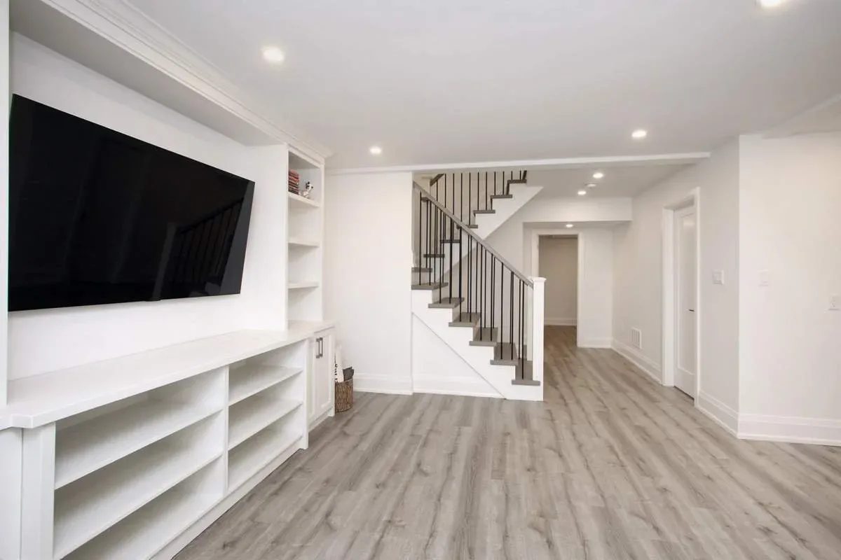 Finished lower-level living space from an Alderwood second-storey addition project.